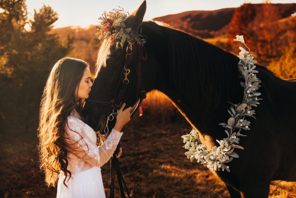 Bride with a white horse surrounded by mountain scenery